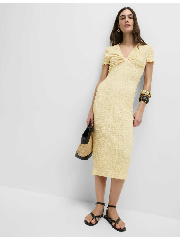 Marks & Spencer Jerseys texturált midi ceruzaruha V-nyakkivágással Marks & Spencer