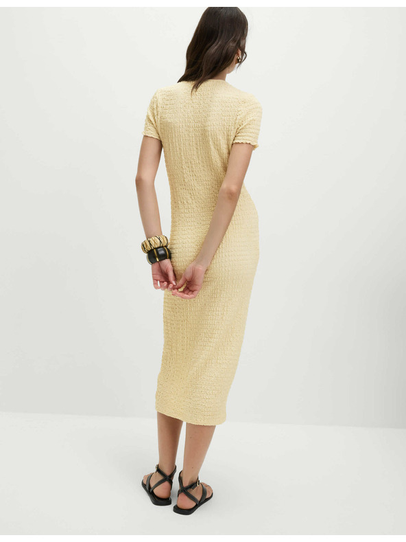 Marks & Spencer Jerseys texturált midi ceruzaruha V-nyakkivágással Marks & Spencer