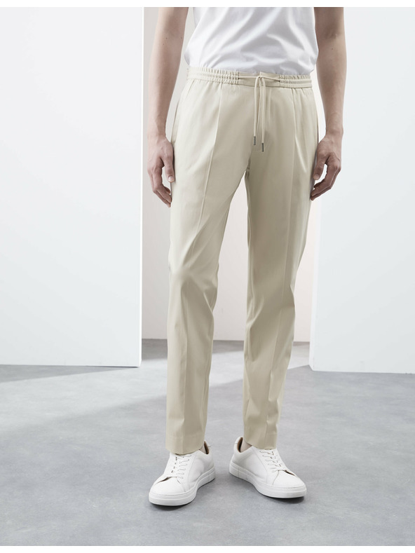 Marks & Spencer Könnyű funkcionális nadrág, enyhén bővített szabású Marks & Spencer bézs színű