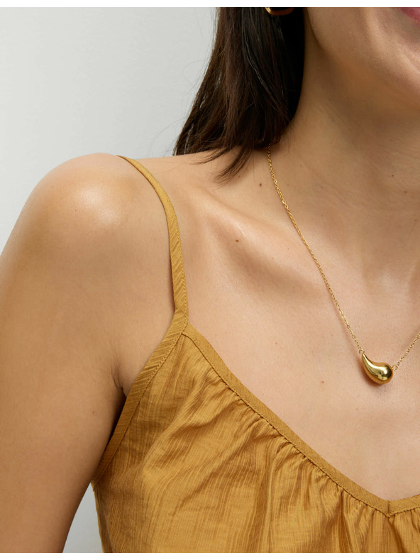 Marks & Spencer Kami felső V-nyakkal és magas lyocell-tartalommal Marks & Spencer sárga