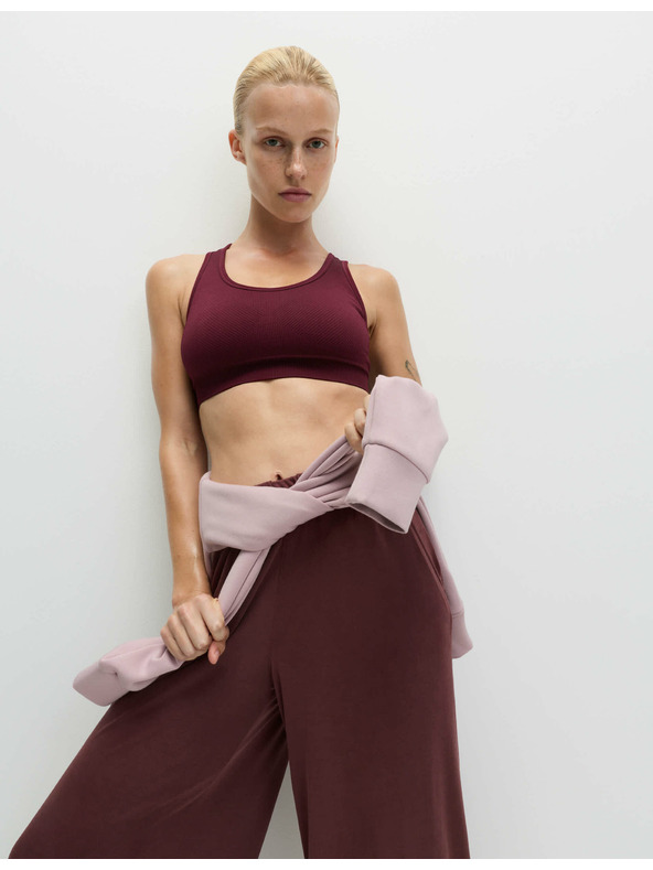 Marks & Spencer Közepes merevítésű kétoldalas varrásmentes sportmelltartó Marks & Spencer piros