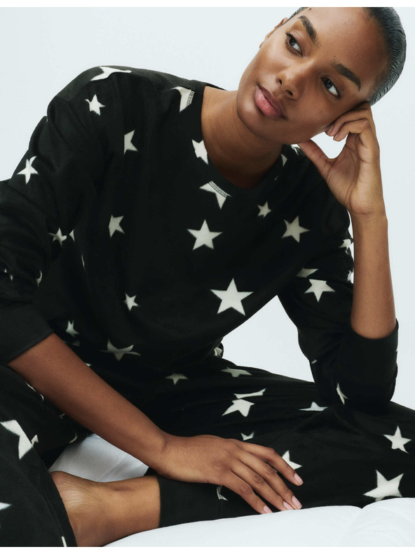 Marks & Spencer Csillag nyomatos polár pizsama szett mandzsettás nadrággal Marks & Spencer fekete
