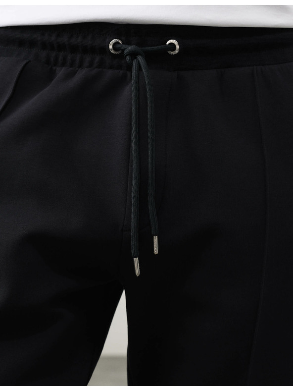 Marks & Spencer Egyenes Pintuck melegítőnadrág magas pamuttartalommal Marks & Spencer fekete