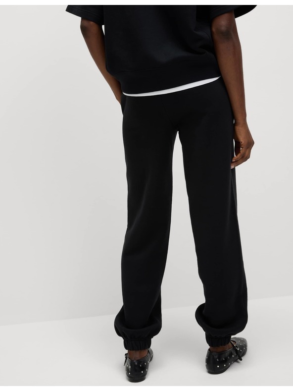 Marks & Spencer Mandzséta végű melegítőnadrág magas pamuttartalommal és húzózsinórral, Marks & Spencer fekete