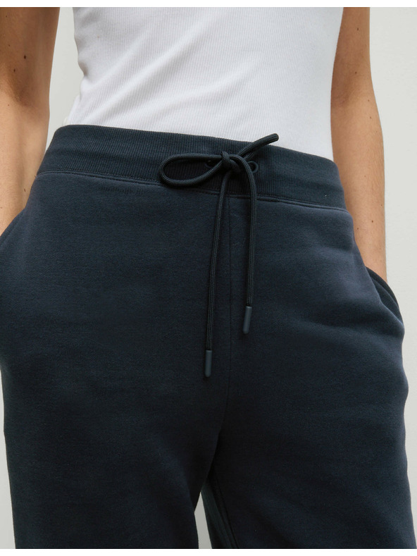 Marks & Spencer Mandzséta végű melegítőnadrág magas pamuttartalommal és húzózsinórral, Marks & Spencer tengerészkék