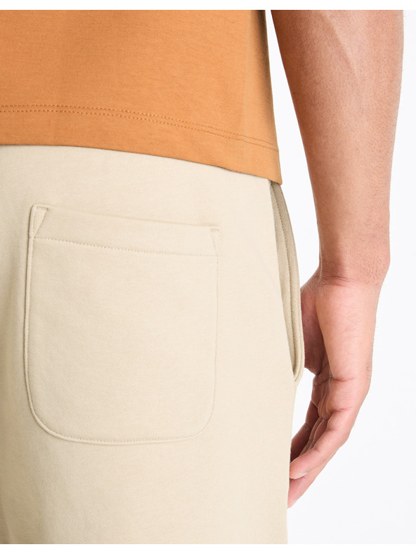 Celio Bézs színű férfi melegítőnadrág Celio Toshort