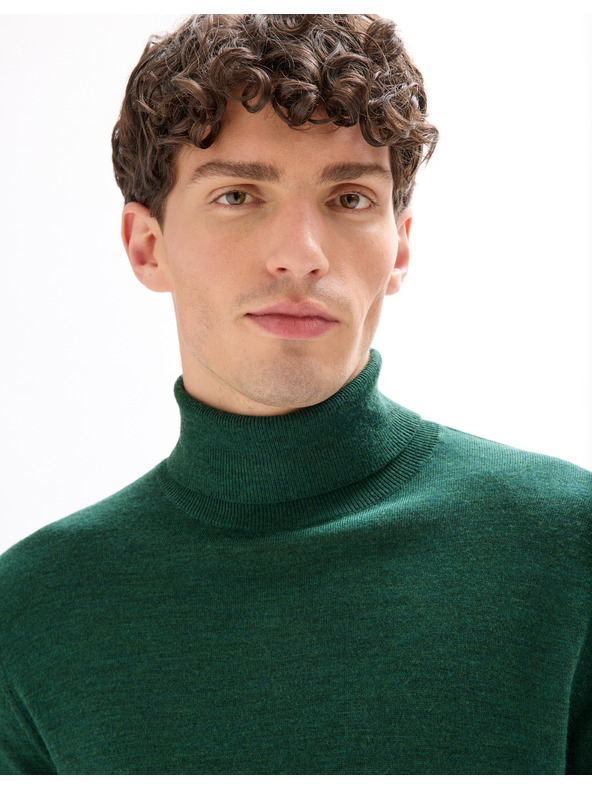 Celio Menos merino garbó