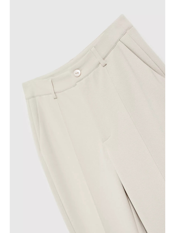 Moodo Elegáns bézs karcsúsított nadrág zsebbel Moodo