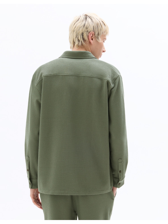 Celio Naseerset felsőing