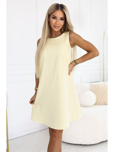 numoco VICTORIA Trapéz ruha ujjak nélkül övvel - vajas sárga