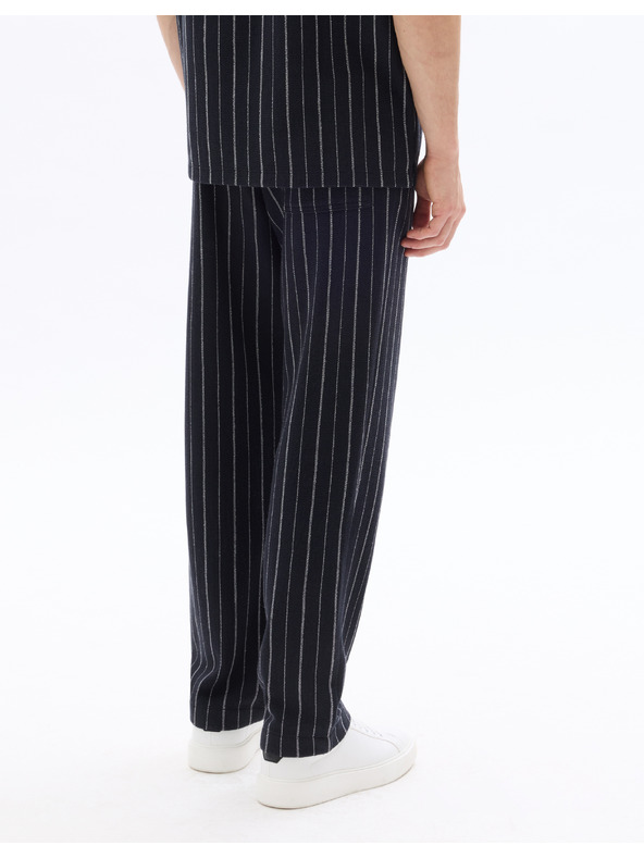Celio 24H Nostripe nadrág