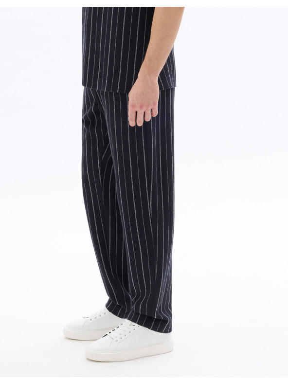 Celio 24H Nostripe nadrág
