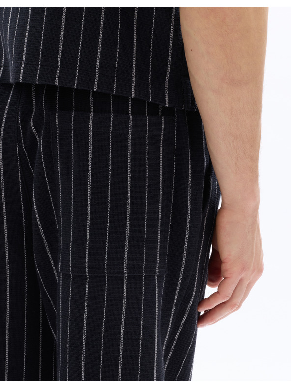 Celio 24H Nostripe nadrág
