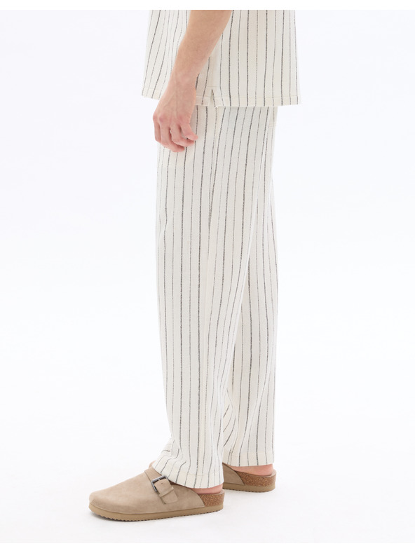 Celio 24H Nostripe nadrág
