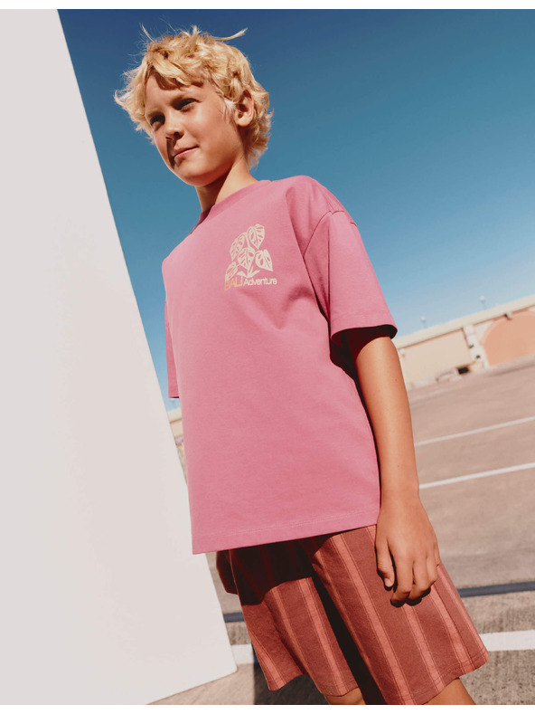 Marks & Spencer Tiszta pamut pólóing Bali-kalandos motívummal (6–16 év) Marks & Spencer rózsaszín