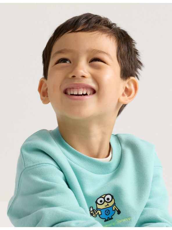 Marks & Spencer Minions™ grafikus pulóver magas pamuttartalommal (2–8 év) Marks & Spencer zöld