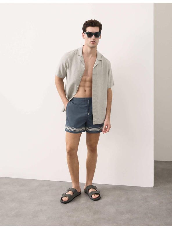 Marks & Spencer Úszóshorts szegélyhímzéssel Marks & Spencer kék