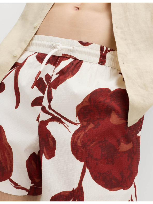 Marks & Spencer Textúrált gyorsan száradó fürdőshorts virágmotívummal Marks & Spencer piros
